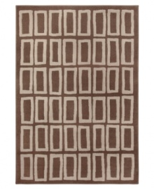 Abstract rectangles in soft neutral tones create a casual and carefree design in the Tribecca area rug from Sphinx. Machine woven from soft and durable polypropylene, this piece is ideal for kids, pets and high traffic areas. (Clearance)