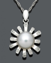 Freshen your look in sweet floral style. This chic pendant features diamond-accented petals, a cultured freshwater pearl center (8-9 mm), and a sterling silver setting. Approximate length: 18 inches. Approximate drop: 7/8 inch. Freshen your look in sweet floral style. This chic pendant features diamond-accented petals, a cultured freshwater pearl center (8-9 mm), and a sterling silver setting. Approximate length: 18 inches. Approximate drop: 7/8 inch.