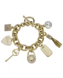 Bring on the charm. Make the perfect first impression with this designer style from Michael Kors. Crafted in gold tone mixed metal, bracelet features a variety of signature charms and Czech crystals with a trendy toggle clasp. Approximate length: 8 inches. Approximate charm drops: 1/2 inch to 1 inch. Bring on the charm. Make the perfect first impression with this designer style from Michael Kors. Crafted in gold tone mixed metal, bracelet features a variety of signature charms and Czech crystals with a trendy toggle clasp. Approximate length: 8 inches. Approximate charm drops: 1/2 inch to 1 inch.