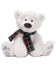 Two shining eyes peer out from a mass of bright white fur on a teddy bear that's far from the North Pole. A plaid scarf makes the Gund cub extra irresistible.