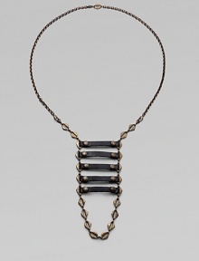 From the Signature Collection. A modern, urban design with an ancient, tribal look, combining hand-stained, antiqued brass links with coated Italian leather.BrassLeatherLength, about 23Double front lobster claspsMade in USA From the Signature Collection. A modern, urban design with an ancient, tribal look, combining hand-stained, antiqued brass links with coated Italian leather.BrassLeatherLength, about 23Double front lobster claspsMade in USA