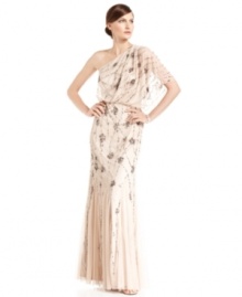 Adrianna Papell's gown is femininity defined. A one-shoulder silhouette is the backdrop for exquisite, hand-beaded detail that evokes the vintage feel of a beautifully refined era. Adrianna Papell's gown is femininity defined. A one-shoulder silhouette is the backdrop for exquisite, hand-beaded detail that evokes the vintage feel of a beautifully refined era.