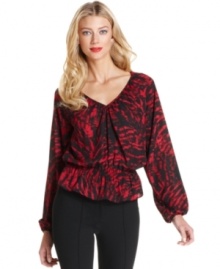 Peasant styling and a rich print make this MICHAEL Michael Kors top an essential this season.