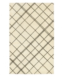 Strike a new chord in your decor. Hand-tufted to produce an incredibly soft hand, this all-wool rug makes a stylish, symmetrical mark, no matter what the surroundings. Strike a new chord in your decor. Hand-tufted to produce an incredibly soft hand, this all-wool rug makes a stylish, symmetrical mark, no matter what the surroundings.