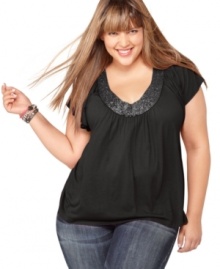 Add sparkle to your casual look with Soprano's short sleeve plus size top, accented by a beaded neckline.