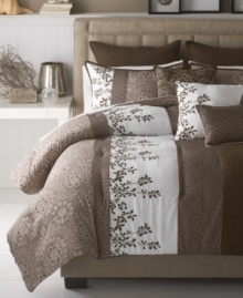 Change of scenery. A new setting starts with this Hilo comforter set, featuring a range of floral and leaf designs in neutral earth tones for a pleasing look. Full of nature-inspired charm, this set comes complete with shams, bedskirt and decorative pillows for a peaceful retreat in the bedroom.