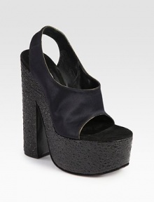 Glistening satin silhouette with a stretchy slingback strap, raised by a uniquely textured leather heel and platform. Textured leather heel, 6 (150mm)Textured leather platform, 2 (50mm)Compares to a 4 heel (100mm)Satin upperLeather lining and solePadded insoleMade in ItalyOUR FIT MODEL RECOMMENDS ordering one size up as this style runs small. Glistening satin silhouette with a stretchy slingback strap, raised by a uniquely textured leather heel and platform. Textured leather heel, 6 (150mm)Textured leather platform, 2 (50mm)Compares to a 4 heel (100mm)Satin upperLeather lining and solePadded insoleMade in ItalyOUR FIT MODEL RECOMMENDS ordering one size up as this style runs small.