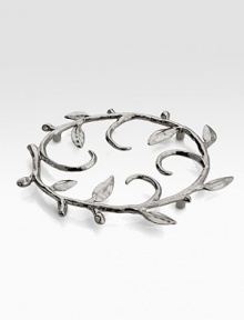 A nickelplated trivet takes its inspiration from the imagery that floats around classic storytelling. The shapes are obvious and immediate and, at the same time, impressionistic and lyrical. From the Vine CollectionNickelplated bronze10 X 8½Hand washImported A nickelplated trivet takes its inspiration from the imagery that floats around classic storytelling. The shapes are obvious and immediate and, at the same time, impressionistic and lyrical. From the Vine CollectionNickelplated bronze10 X 8½Hand washImported