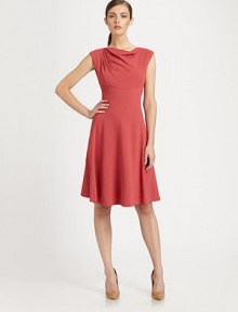 Ultra-feminine, this cap-sleeve dress with a draped neckline and flattering seams is an undeniable must-have. Draped necklineCap sleevesIntriguing seamsConcealed back zipperAbout 24 from natural waist70% viscose/28% virgin wool/2% elastaneDry cleanImported of Italian fabric Model shown is 5'9½ (176cm) wearing US size 4. 