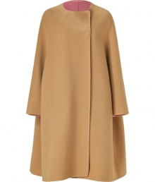 A pristine example of the contemporary Jil Sander look, this soft camel wool coat is a statement must-have for modern-minimalist wardrobes - collarless, seamed long dolman sleeves, hidden front snaps, side slit pockets, rose unlined interior - Oversized flared retro silhouette - Team with monochrome separates and jet black accessories