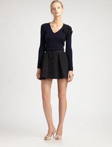 Featuring an ultra-feminine point d'esprit bow, this cozy sweater is a must-wear this season.V-neckBow detail at shoulderLong sleevesPull-on styleAbout 23 from shoulder to hemWool/viscose/polyamide/angoraDry cleanMade in Italy of imported fabric Model shown is 5'10 (177cm) wearing US size Small. 