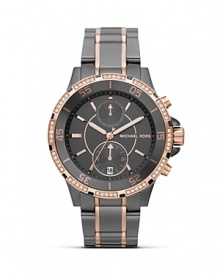 Surrender to sparkle with this Swarovski crystal-rimmed watch from MICHAEL Michael Kors, boasting an oversized case, sleek stainless steel bracelet and chronograph movement. Surrender to sparkle with this Swarovski crystal-rimmed watch from MICHAEL Michael Kors, boasting an oversized case, sleek stainless steel bracelet and chronograph movement.