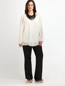 A heavenly silk design featuring delicate dolman sleeves, sophisticated embroidery, and an out-of-this-world fit.Gathered details at necklineDolman sleevesRelaxed fitPull-on styleEmbroidered detailsCurved hemAbout 29 from shoulder to hemSilkDry cleanImported