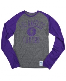 Rush the court! Be a part of the team victory with this Los Angeles Lakers NBA raglan shirt from adidas. Rush the court! Be a part of the team victory with this Los Angeles Lakers NBA raglan shirt from adidas.