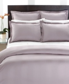 Boasting tonal jacquard stripes on 700 thread count MicroCotton, this Hotel Collection duvet cover is the essence of understated sophistication. Featuring button closure. Boasting tonal jacquard stripes on 700 thread count MicroCotton, this Hotel Collection duvet cover is the essence of understated sophistication. Featuring button closure.