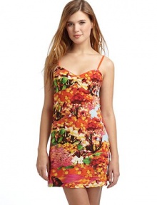 THE LOOKAllover floral printCinched detail at bustAdjustable spaghetti strapsOpen back with strap detailTHE FITAbout 33 from shoulder to hemTHE MATERIALPolyester/spandexCARE & ORIGINMachine washImportedModel shown is 5'10 (177cm) wearing US size Small. 