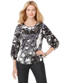 Of a fashionable feather: T Tahari creates a gorgeous peacock-printed blouse that style mavens are sure to flock to. Pair with slim dark pants and heels for a flawless office look! (Clearance) Of a fashionable feather: T Tahari creates a gorgeous peacock-printed blouse that style mavens are sure to flock to. Pair with slim dark pants and heels for a flawless office look! (Clearance)