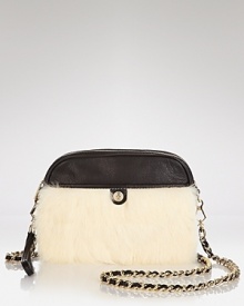 This season the mini bag makes major impact, like this fur-trimmed style from Rebecca Minkoff. It's our plush party-right crush. This season the mini bag makes major impact, like this fur-trimmed style from Rebecca Minkoff. It's our plush party-right crush.