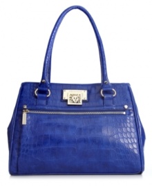 Gorgeous gator pattern is paired with delicate silver-tone hardware in this go-anywhere satchel from AK Anne Klein. A well-organized interior provides discrete pockets for sunglasses, cell phone and PDA. Gorgeous gator pattern is paired with delicate silver-tone hardware in this go-anywhere satchel from AK Anne Klein. A well-organized interior provides discrete pockets for sunglasses, cell phone and PDA.