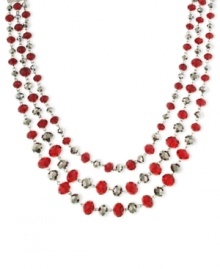 Look resplendent in red. This three-strand necklace from 2028 is crafted from mixed metal with red beads and glass crystals for a stunning look. Approximate length: 16 inches + 3-inch extender. Look resplendent in red. This three-strand necklace from 2028 is crafted from mixed metal with red beads and glass crystals for a stunning look. Approximate length: 16 inches + 3-inch extender.