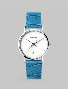 From the Koppel Collection. A vibrant alligator-embossed strap punctuates this sporty yet elegant timepiece.Quartz movement Water-resistant to 3 ATM Stainless steel case, 32mm (1.25) White dial Date display at 6 o'clock Second hand Alligator-embossed calfskin strap Comes with extra black calfskin strap Made in Switzerland From the Koppel Collection. A vibrant alligator-embossed strap punctuates this sporty yet elegant timepiece.Quartz movement Water-resistant to 3 ATM Stainless steel case, 32mm (1.25) White dial Date display at 6 o'clock Second hand Alligator-embossed calfskin strap Comes with extra black calfskin strap Made in Switzerland