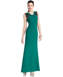 Be gorgeous in this green evening gown from BCBGMAXAZRIA--lace insets at the shoulders add a shot of decadence.