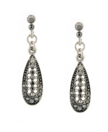 Tasteful tear drops are the perfect accent to any ensemble. 2028's glittering earrings feature a graceful shape highlighting round-cut hematite crystals set in silver tone mixed metal. Approximate drop: 1 inch. Tasteful tear drops are the perfect accent to any ensemble. 2028's glittering earrings feature a graceful shape highlighting round-cut hematite crystals set in silver tone mixed metal. Approximate drop: 1 inch.