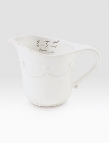 As practical as it is pretty, this confection for your counter top is decorated with a Berry & Thread motif outside and handy measurements in dark brown script inside.Ceramic stoneware20 oz. capacity4¼H X 7WDishwasher- & microwave-safeImported As practical as it is pretty, this confection for your counter top is decorated with a Berry & Thread motif outside and handy measurements in dark brown script inside.Ceramic stoneware20 oz. capacity4¼H X 7WDishwasher- & microwave-safeImported
