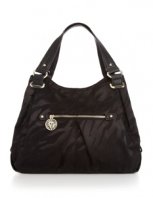 Get a safari-chic look with this tonal animal print design from Anne Klein. Accented with silvertone hardware and signature charms, this shopper will take you anywhere in style. Get a safari-chic look with this tonal animal print design from Anne Klein. Accented with silvertone hardware and signature charms, this shopper will take you anywhere in style.