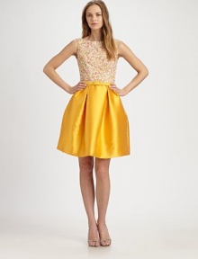 Flirty and playful, with a milti-colored sequined bodice and a vibrant, lustrous full skirt.BoatneckSleevelessSelf belt with covered buckleFull pleated skirtConcealed back zipFully linedAbout 22 from natural waist85% polyester/15% silkSpot cleanImportedModel shown is 5'9½ (176cm) wearing US size 4. 