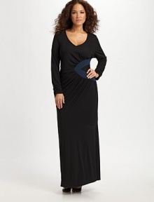 An asymmetrical ruched triangle waist detail gives this style a flattering form. V-neck Long sleeves with ruched cuffs Pull-on style Maxi dress with seamed detail About 61 from shoulder to hem 72% viscose/28% polyester Machine wash Imported 