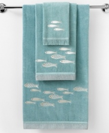 There are plenty of fish in the sea. Swim into a serene beach haven with this Nantucket hand towel, featuring enchanting silver fish on a cool blue backdrop for a soothing presentation. There are plenty of fish in the sea. Swim into a serene beach haven with this Nantucket hand towel, featuring enchanting silver fish on a cool blue backdrop for a soothing presentation.