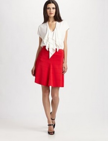 Azrouel's mastery of effortless-feeling tough-chic shows in this supple silk style, which employs asymmetrically draped panels to form a ruffle at the neck.U necklineCap sleevesDraped front panelsHigh V back detailAbout 28 from shoulder to hemSilkDry cleanMade in USA of imported fabricModel shown is 5'9 (175cm) wearing US size 4. 