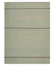 Subtle striping gives way to understated sophistication in the Horizon area rug from Calvin Klein. Generously thick wool fibers are hand tufted in India for remarkable strength and detailed design. Perfect for mixing with any style decor.