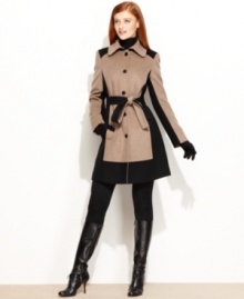 Cool colorblocking adds a fresh look to Calvin Klein's sleek wool-blend trench coat. Cool colorblocking adds a fresh look to Calvin Klein's sleek wool-blend trench coat.