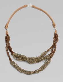Earth tones abound this season so this design with glass beads and silver-clasped leather tie is right on trend.Glass, silver, leatherSilver closureMade in Italy Earth tones abound this season so this design with glass beads and silver-clasped leather tie is right on trend.Glass, silver, leatherSilver closureMade in Italy