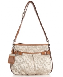 This classic signature hobo by Tagnanello easily transcends seasons with its fresh, timeless appeal. A double entry design brings top functionality to this beautiful design, with both zipper top and magnetic snap pockets at top. Polished silvertone hardware and a detachable bag tag complete this look. This classic signature hobo by Tagnanello easily transcends seasons with its fresh, timeless appeal. A double entry design brings top functionality to this beautiful design, with both zipper top and magnetic snap pockets at top. Polished silvertone hardware and a detachable bag tag complete this look.
