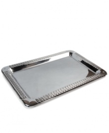 Engraved for timeless style in stainless steel and silver plate, the Watchband bar tray from Lauren Ralph Lauren adds sleek polish to cocktail service. Engraved for timeless style in stainless steel and silver plate, the Watchband bar tray from Lauren Ralph Lauren adds sleek polish to cocktail service.