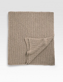 A nubby bouclé knit crafted with comfort in mind from remarkably soft and luxurious cashmere. 56 X 72 Cashmere; dry clean Imported 