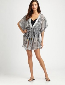 EXCLUSIVELY AT SAKS.COM. The prettiest pailettes decorate this flowy, skin-baring coverup.V-neckFlutter sleevesPull-on styleDrawstring waistSilkDry cleanMade in Italy EXCLUSIVELY AT SAKS.COM. The prettiest pailettes decorate this flowy, skin-baring coverup.V-neckFlutter sleevesPull-on styleDrawstring waistSilkDry cleanMade in Italy