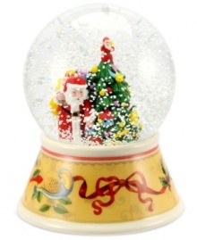 All kinds of merry, the annual Christmas Tree snow globe from Spode combines the cheery new partridge and pear tree motif with Santa Claus under a flurry of snow.