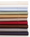 Featuring pure cotton sateen and a smooth 300 thread count, Dunham sheeting continues the Lauren Ralph Lauren Home tradition of classic style with a palette of bold hues. The pillowcases and flat sheet boast pleat detailing along the cuff.