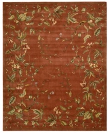 Exquisitely chic with an alluring vine and leaf motif, this area rug is hand tufted and hand carved from only the finest premium wool. Set against a persimmon-hued ground, it's expertly washed to lend the surface a handsome luster, texture and sheen. Exquisitely chic with an alluring vine and leaf motif, this area rug is hand tufted and hand carved from only the finest premium wool. Set against a persimmon-hued ground, it's expertly washed to lend the surface a handsome luster, texture and sheen.