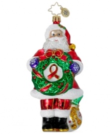 Take steps to prevent and raise awareness about AIDS with the Claus for a Cause charity ornament from Christopher Radko. Santa shows his support with a wreath trimmed in red ribbon.