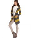 In a nubby striped knit, this Free People cardigan is perfect for layering on-trend texture!