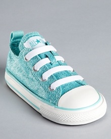 The classic canvas sneaker from Converse, rendered in a metallic canvas and bungee laces for easy on/off action. The classic canvas sneaker from Converse, rendered in a metallic canvas and bungee laces for easy on/off action.