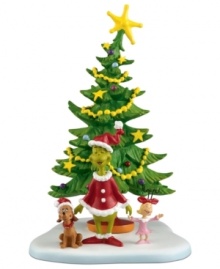 The Grinch's heart swells as he sings in Christmas day down in Whoville. Max and Cindy Lou Who are also full of joy, together in front of the tree. A whimsical figurine for Dr. Seuss fans, from Department 56.