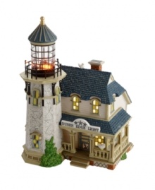 Full of New England charm and small town simplicity, the Dunes Edge Lighthouse becomes a focal point of your village-scape. Intricate details, like a wrap-around porch, towering lighthouse with trestles and bright windows, bring new life to your favorite holiday display.