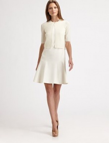 Finespun wool, knit in a bolero silhouette and fastened with a single snap closure at the neckline.Jewel necklineSingle button closureShort sleevesRib-knit edgesAbout 16 from shoulder to hemWoolDry cleanMade in SwitzerlandModel shown is 5'10 (177cm) wearing US size 4. Finespun wool, knit in a bolero silhouette and fastened with a single snap closure at the neckline.Jewel necklineSingle button closureShort sleevesRib-knit edgesAbout 16 from shoulder to hemWoolDry cleanMade in SwitzerlandModel shown is 5'10 (177cm) wearing US size 4.