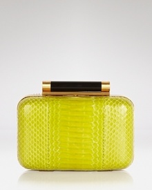 The evening goes somewhere exotic with this boxy, DIANE von FURSTENBERG clutch, crafted of watersnake with a palm-perfect shape. The evening goes somewhere exotic with this boxy, DIANE von FURSTENBERG clutch, crafted of watersnake with a palm-perfect shape.
